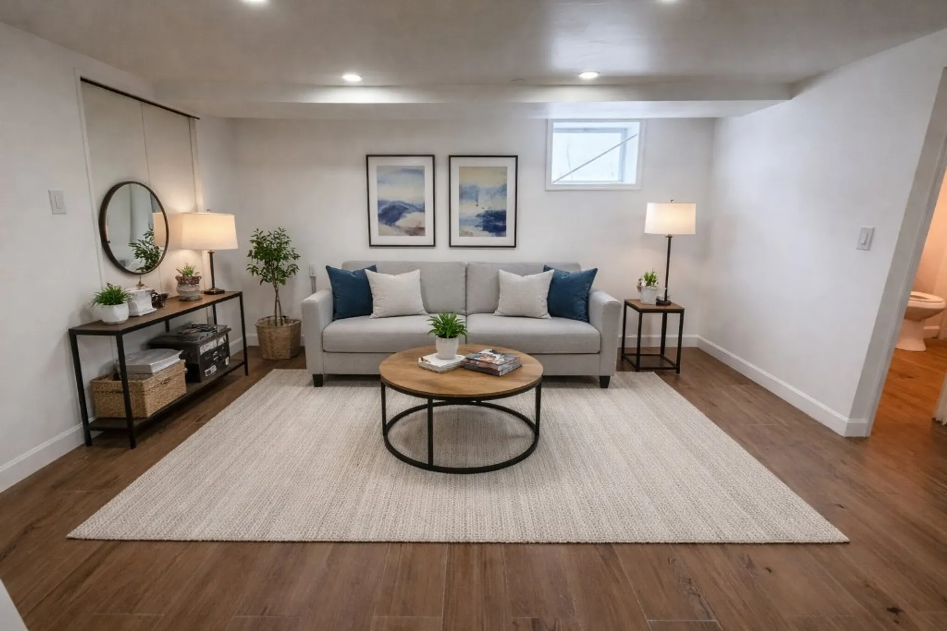 Finished basement living room renovation completed in Albany, NY by Capital Handy Manny